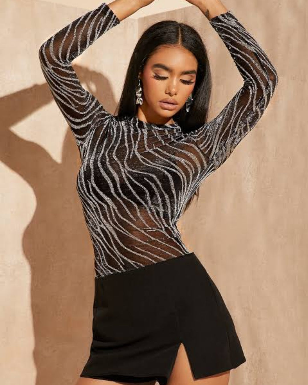 Blusa mesh con glitter